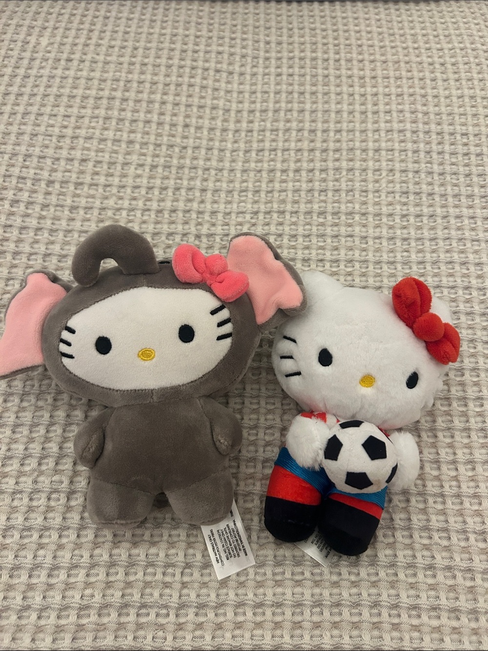 Hello Kitty Plush Duo in Gray Elephant Suit & White with Red Bow Soccer